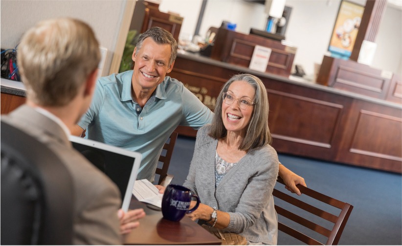 Group of people discussing investment management process